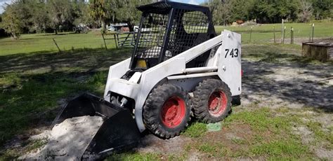 towing with a skid steer|bobcat skid steer towing.